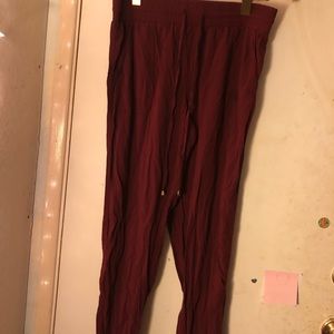 Super cute red pants with gold tie